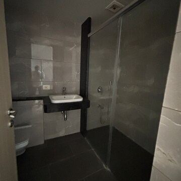 Bathroom in 4 BHK Apartment at Rustomjee Crown, Gokhale Road – for Rent