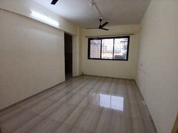 Living Room in 1 BHK Apartment at Kopar Khairane – for Rent