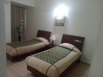 Bedroom in 3 BHK Apartment at DLF Park Place, Sector 54 – for Rent