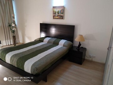 Bedroom in 3 BHK Apartment at DLF Park Place, Sector 54 – for Rent