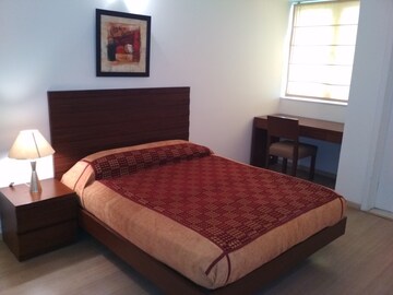 Bedroom in 3 BHK Apartment at DLF Park Place, Sector 54 – for Rent