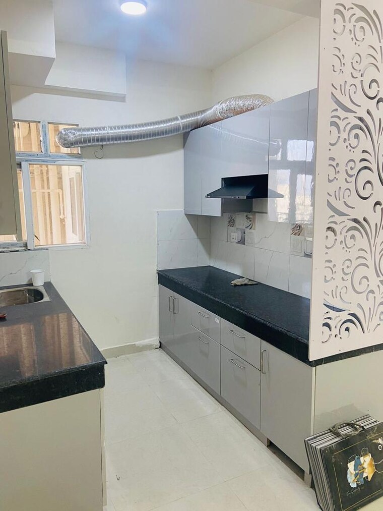 Kitchen, signature-global-the-roselia 2 Bedroom 517 Sq.Ft. Apartment In Sector 95a Gurgaon 8421921