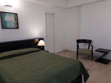Bedroom in 4 BHK Apartment at DLF Park Place, Sector 54 – for Rent