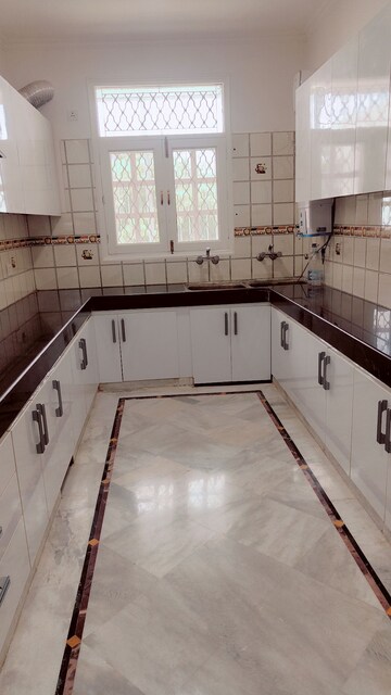 Kitchen in 3.5 BHK Builder Floor at DLF Atria, Dlf Phase ii – for Rent