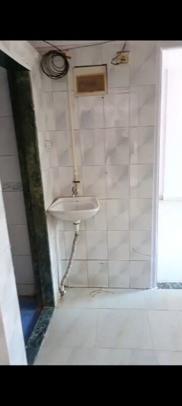 Bathroom in 1 BHK Apartment at Audumber CHS, Goregaon West – for Rent