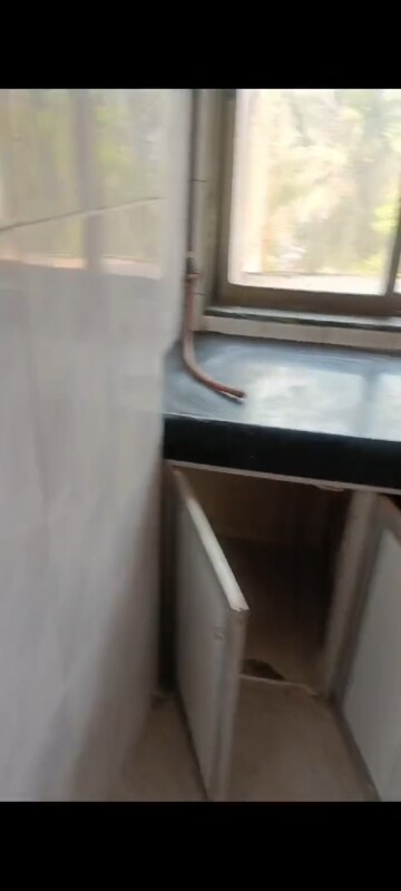 Kitchen in 1 BHK Apartment at Audumber CHS, Goregaon West – for Rent
