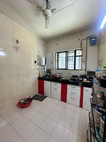 Kitchen in 2 BHK Apartment at Mahadkar Residency, Paud Road – for Rent