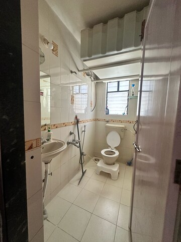 Bathroom in 2 BHK Apartment at Mahadkar Residency, Paud Road – for Rent