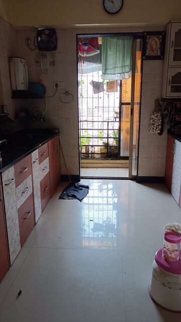 Kitchen in 2 BHK Apartment at Shreeji Park, Kalyan West – for Sale