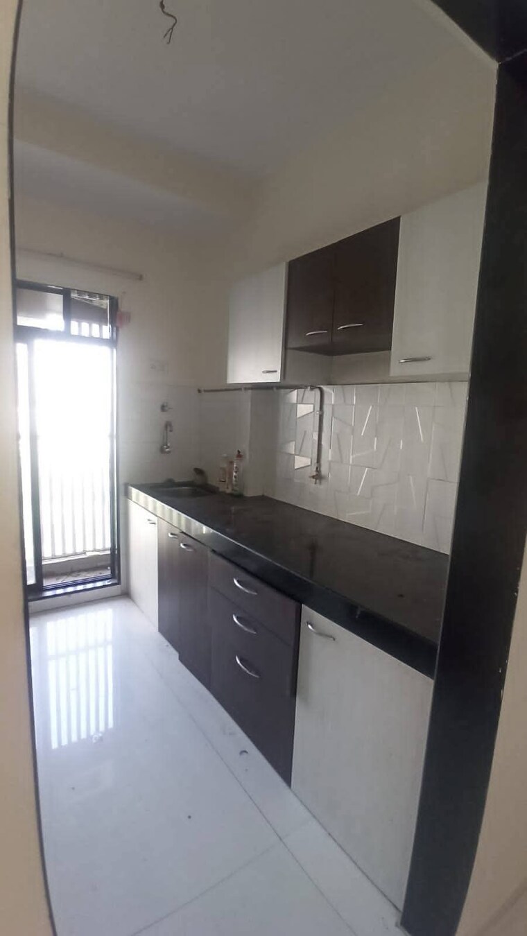Kitchen, rna-ng-canary 1 Bedroom 600 Sq.Ft. Apartment In Mira Road Thane 8422134