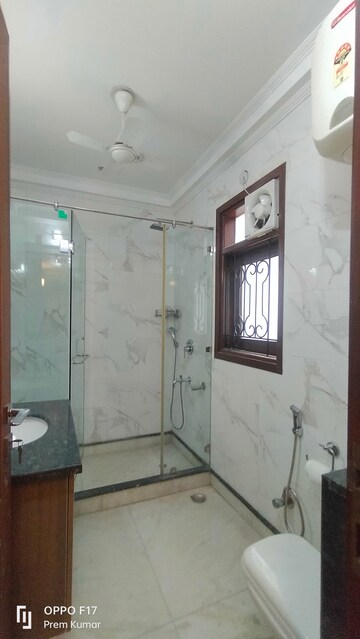 Bathroom in 3 BHK Apartment at Defence Colony – for Rent