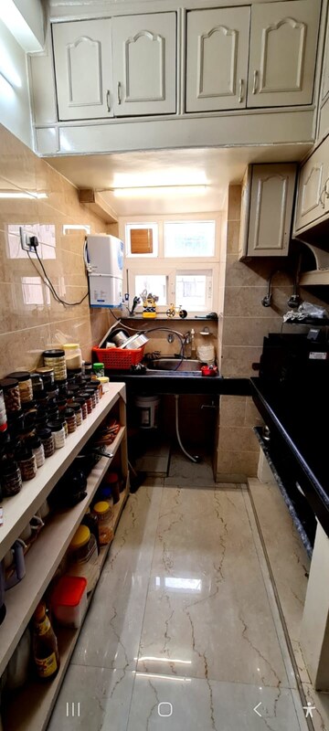 Kitchen in 2.5 BHK Apartment at Madhur Apartment, Paschim Vihar – for Rent