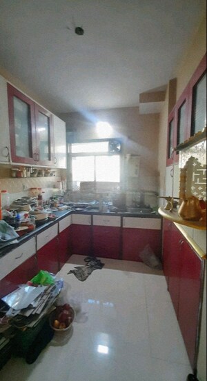 Kitchen in 2 BHK Apartment at Swastik Residency Phase II CHS Ltd, Ghodbunder Road – for Sale