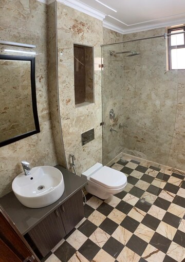 Bathroom in 4 BHK Apartment at Boutique Residential Apartments A-10, Gulmohar Park – for Rent