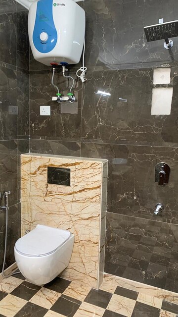 Bathroom in 4 BHK Apartment at Boutique Residential Apartments A-10, Gulmohar Park – for Rent