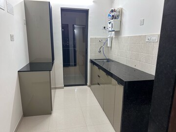 Kitchen in 1 BHK Apartment at Shapoorji Pallonji Joyville Celestia, Hadapsar – for Rent
