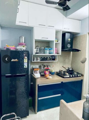 Kitchen in 2 BHK Apartment at Dosti West County, Balkum Pada – for Rent