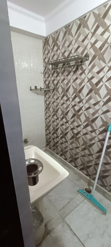 Bathroom in 3 BHK Builder Floor at Rohini Sector 7 – for Rent