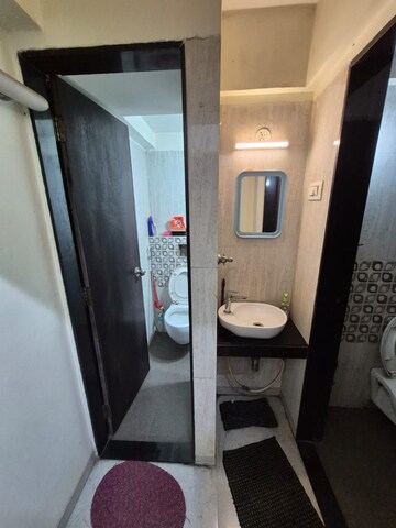 Bathroom in 1 BHK Apartment at The Baya Goldspot, Andheri East – for Sale