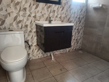 Bathroom in 3 BHK Apartment at Elite Golf Green, Sector 79 – for Sale