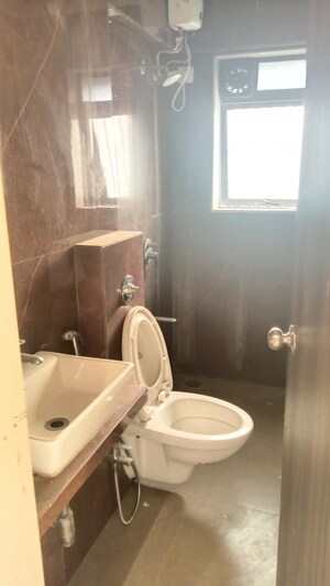 Bathroom in 2 BHK Apartment at Dn Nagar – for Sale