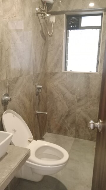 Bathroom in 2 BHK Apartment at Dn Nagar – for Sale