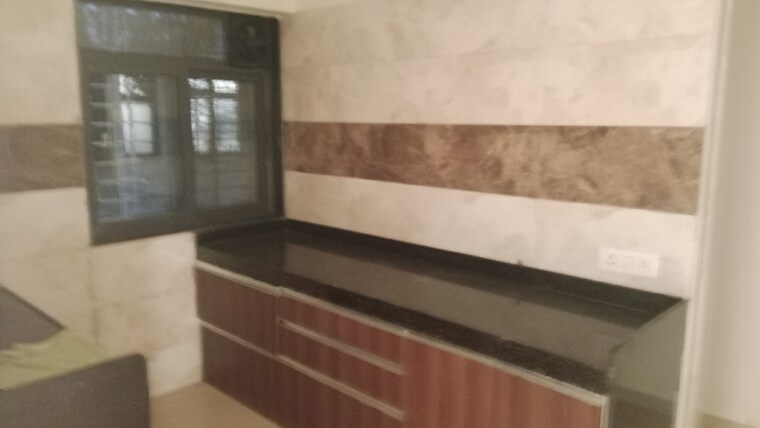 Kitchen, dn nagar 2 Bedroom 650 Sq.Ft. Apartment In Dn Nagar Mumbai 8422747