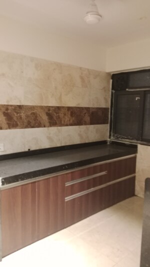 Kitchen in 2 BHK Apartment at Dn Nagar – for Sale