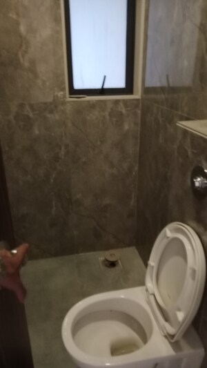 Bathroom in 2 BHK Apartment at Dn Nagar – for Sale