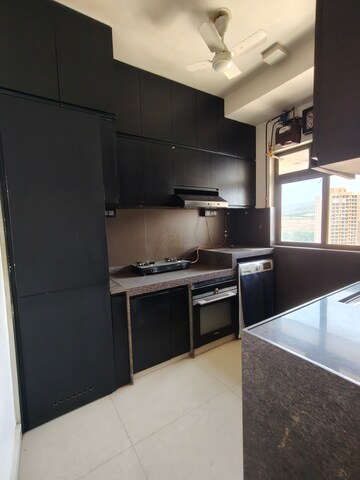 Kitchen in 2 BHK Apartment at Lalani Grandeur, Goregaon East – for Rent