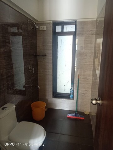 Bathroom in 1 BHK Apartment at Spring Grove Uno Society, Kandivali East – for Rent