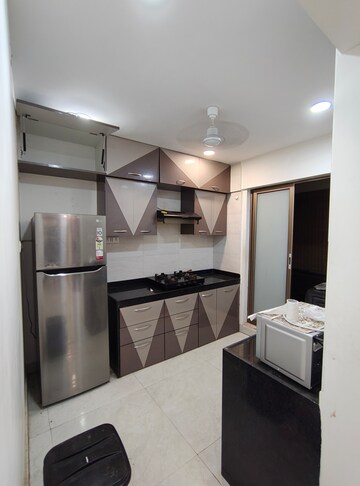 Kitchen in 1.5 BHK Apartment at MJ Shah Centrio, Govandi – for Rent