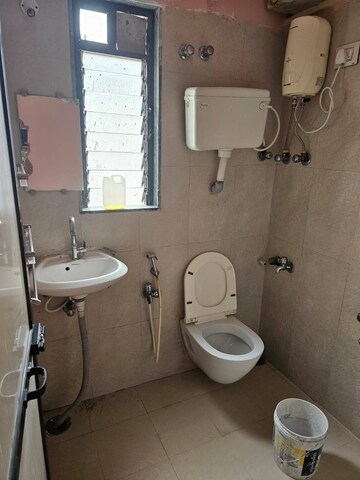 Bathroom in 1 BHK Apartment at Karan CHS Versova, Versova – for Rent