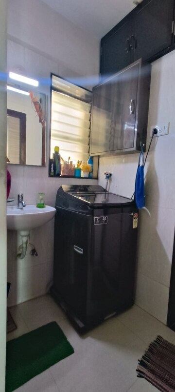 Utility Room in 1.5 BHK Apartment at Shree Satya Shankar Residency, Manpada – for Sale