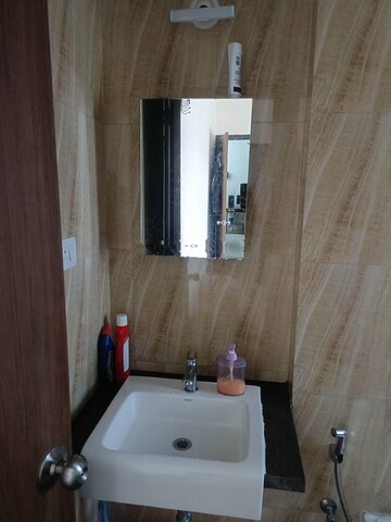 Bathroom in 3 BHK Apartment at Runwal Eirene, Balkum Pada – for Rent