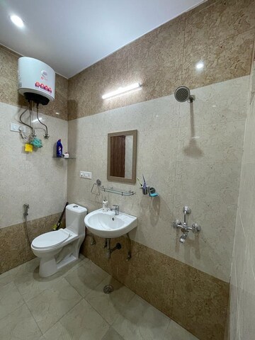 Bathroom in 2 BHK Apartment at Vasundhara Sector 1 – for Rent