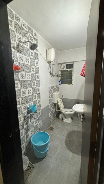 Bathroom in 2 BHK Apartment at Vasundhara Sector 1 – for Rent