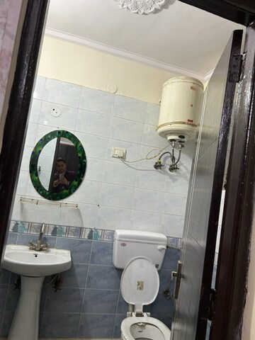 Bathroom in 2 BHK Apartment at Vasundhara Sector 1 – for Rent