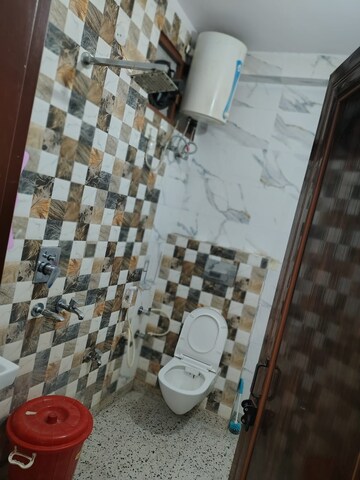 Bathroom in 3 BHK Builder Floor at Dwarka Mor – for Rent