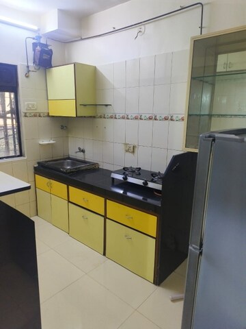 Kitchen in 1 BHK Apartment at Bindra Complex, Andheri East – for Rent