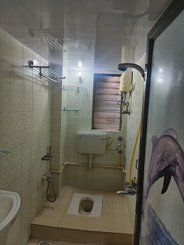 Bathroom in 1 BHK Apartment at Bindra Complex, Andheri East – for Rent