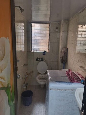 Bathroom in 1 BHK Apartment at Bindra Complex, Andheri East – for Rent