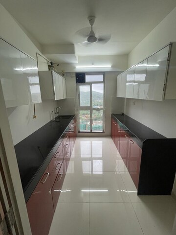 Kitchen in 3 BHK Apartment at Godrej Emerald, Ghodbunder Road – for Rent