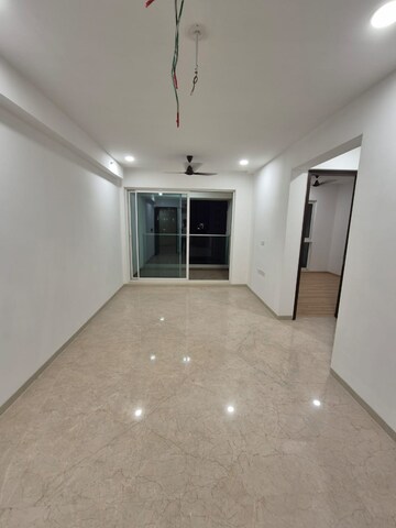 Living Room in 1 BHK Apartment at Aurum Q Residences, Ghansoli – for Rent