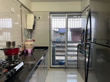 Kitchen in 2 BHK Apartment at Delta Garden, Mira Road – for Sale
