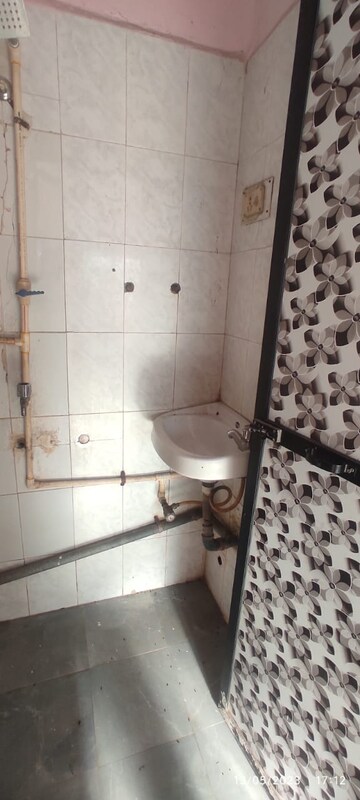 Bathroom in 2 BHK Apartment at Kopar Khairane – for Rent