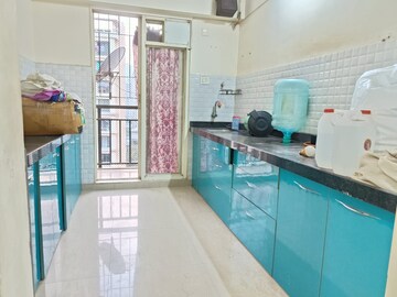 Kitchen in 2 BHK Apartment at Rosa Gardenia, Ghodbunder Road – for Sale