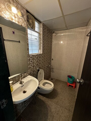Bathroom in 1 BHK Apartment at Koregaon Park CHS, Koregaon Park – for Rent