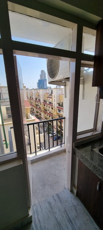 Balcony in 1 RK Apartment at Emaar Emerald Floors Premier, Sector 65 – for Rent