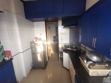 Kitchen in 3 BHK Apartment at Vardhman Gardens, Balkum Pada – for Sale